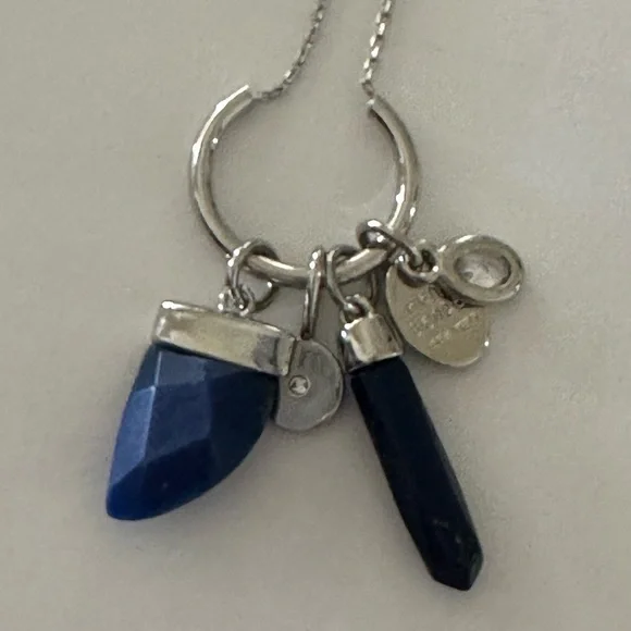 Henri Bendel  silver tone necklace with dark blue crystal and logo charms disc - Picture 6 of 9